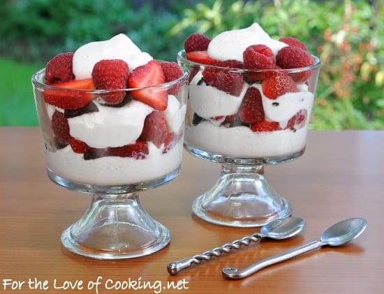 berry parfait with homemade vanilla bean whipped cream and crushed oreo cookies