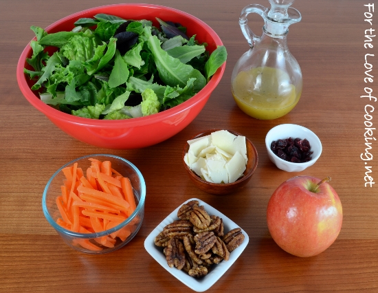 Mixed Greens Salad with Apples, Carrots, Candied Pecans, and Parmesan topped with Maple-Mustard Vinaigrette
