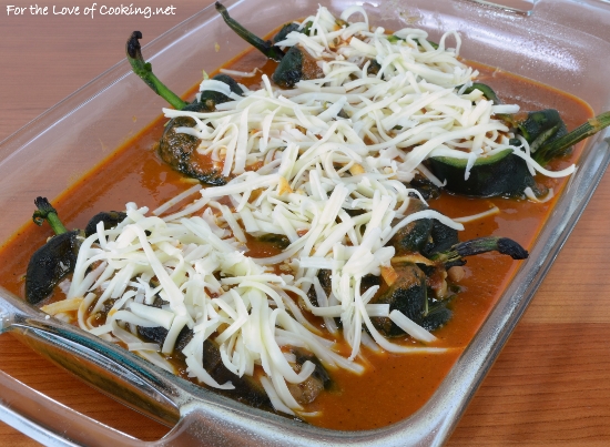 Cheesy Roasted Poblano Peppers with Homemade Refried Beans and Enchilada Sauce