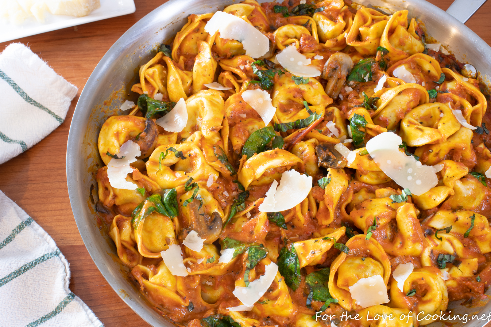 Italian Sausage Tortellini Skillet with Mushrooms and Spinach in a Creamy Tomato Sauce